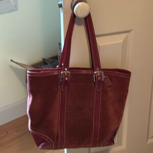 Coach Bag # H0782-F11211 Deep rust color in good used condition